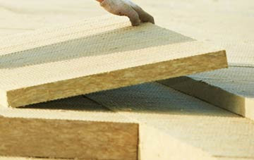 measuring Dunn Street tapered insulation